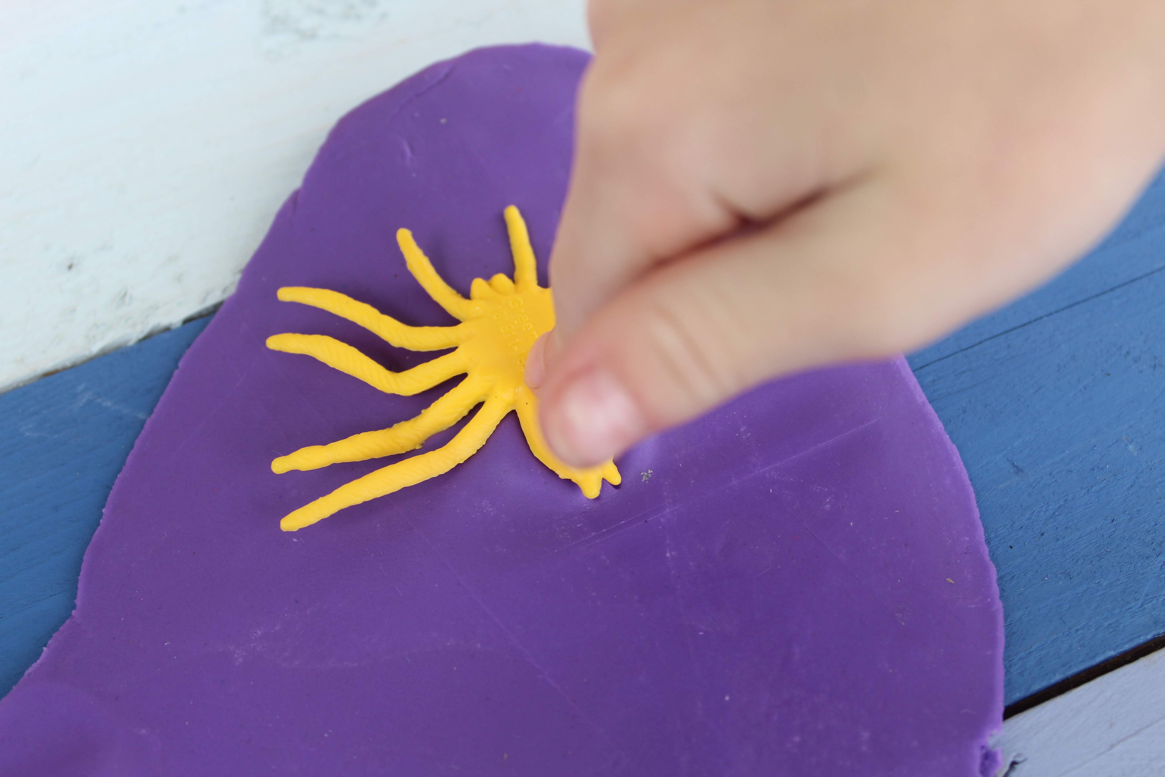 Playdough Insect Fossils Idea - Milestone Mom, LLC