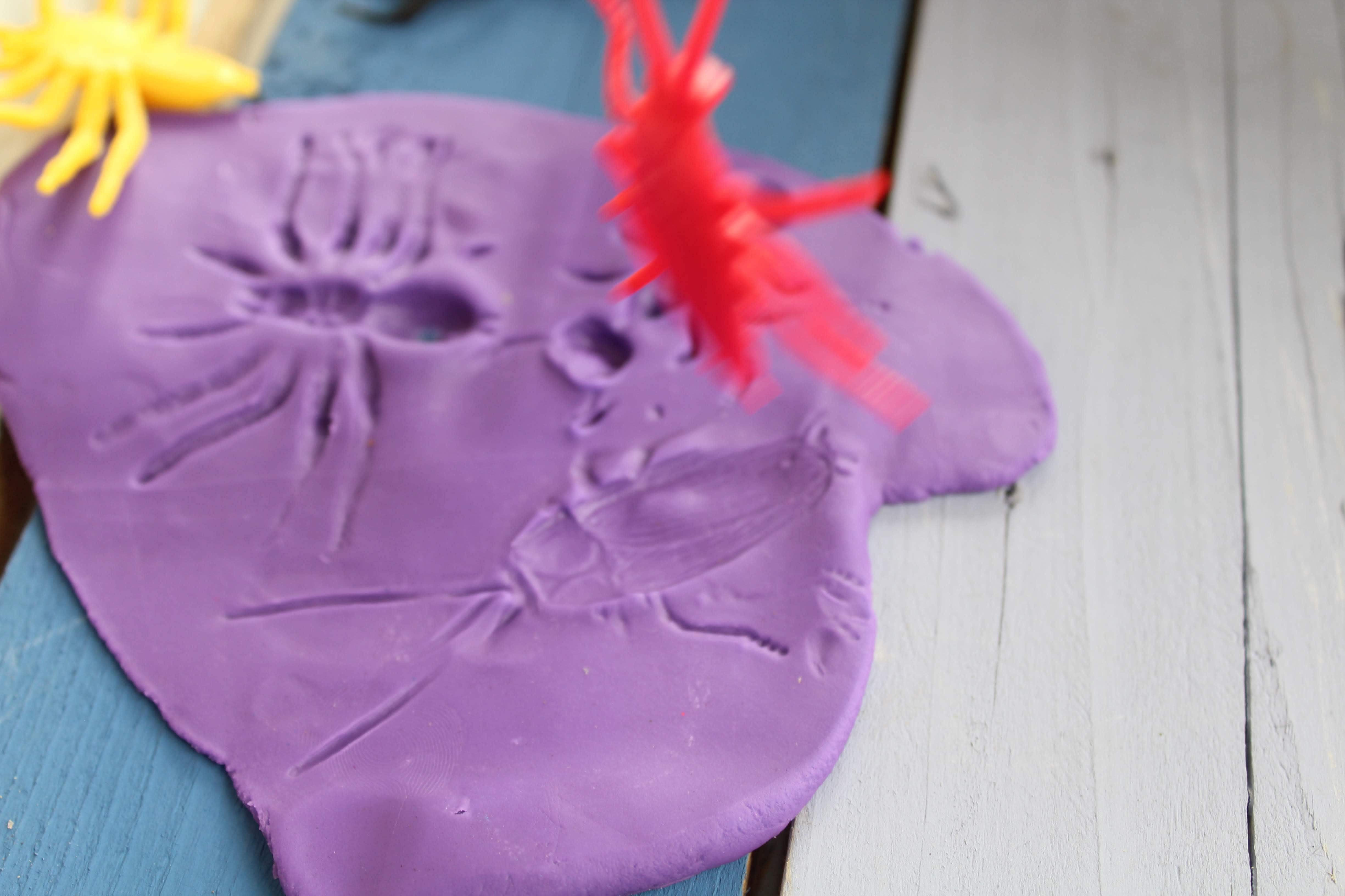 Playdough Insect Fossils Idea - Milestone Mom, LLC